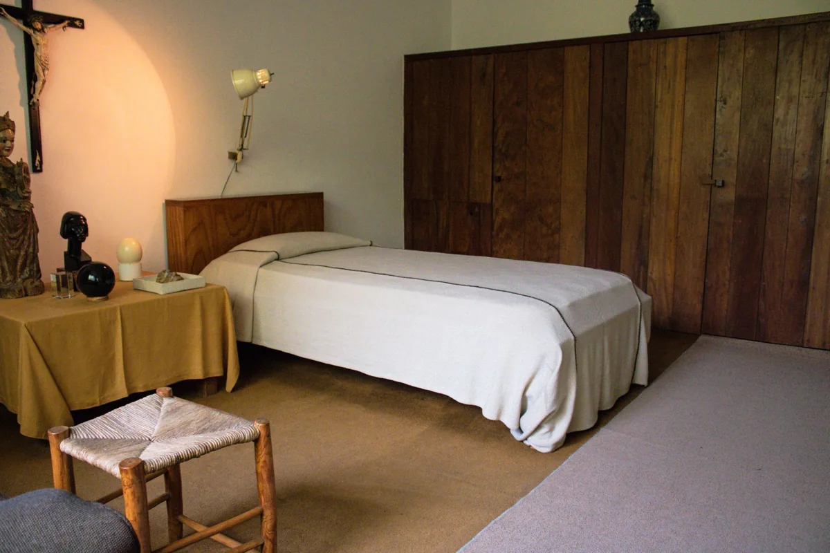 Bedroom with a bed and wooden furniture
